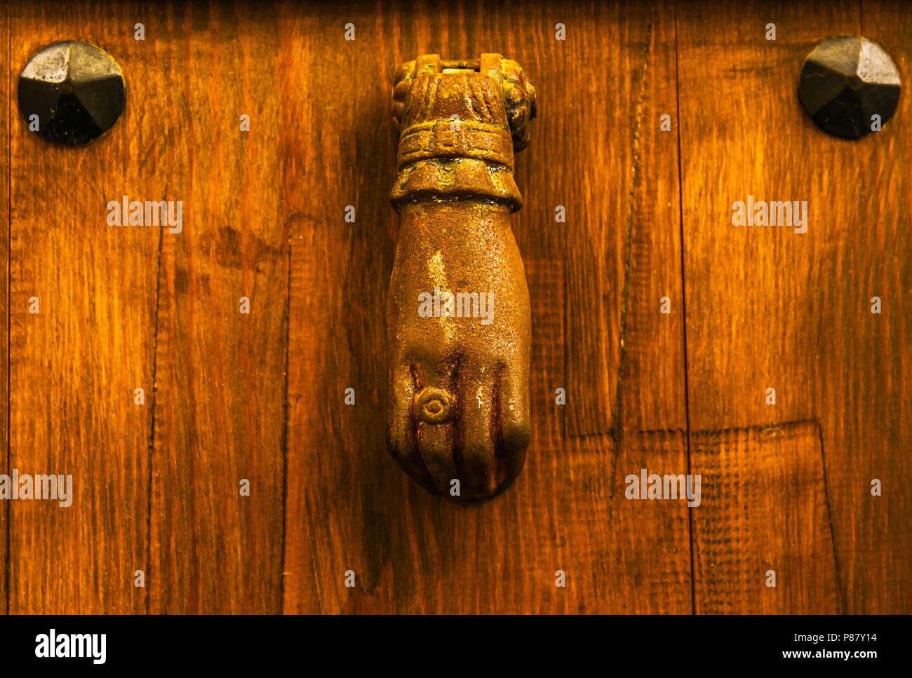 Door With Brass Knocker In The Shape Of A Hand Beautiful Entrance