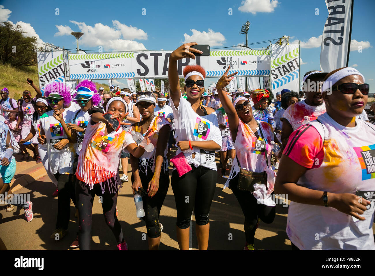Soweto, South Africa, April 17, 2017, Diverse people running in The ...