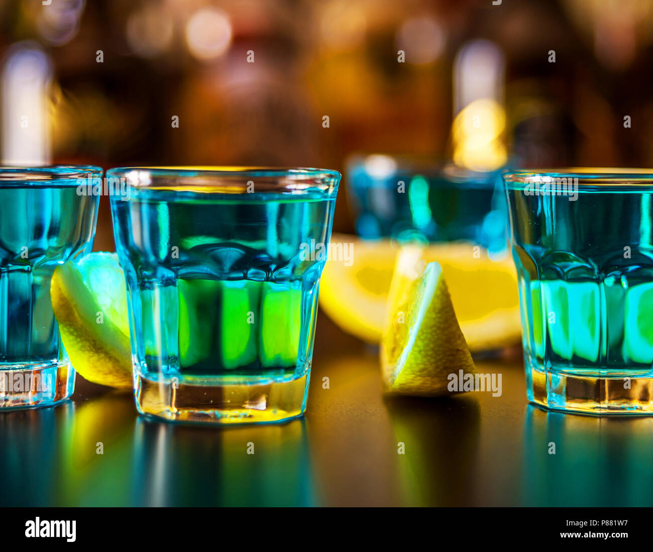 Popular blue drink shot kamikaze on the background of the bar with ...