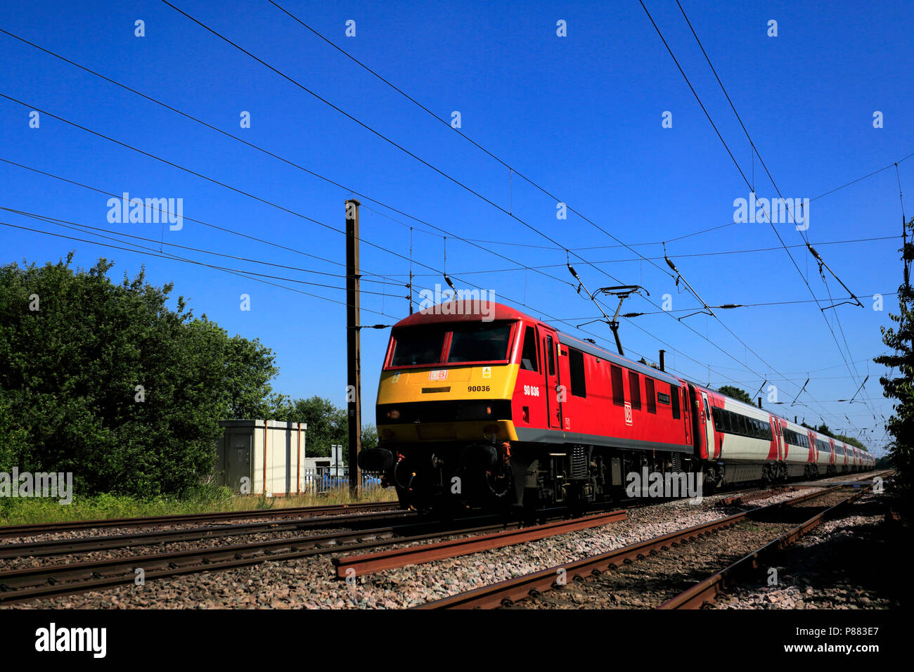DB 90036 pulling Virgin Trains carriages, East Coast Main Line Railway, Peterborough, Cambridgeshire, England, UK Stock Photo