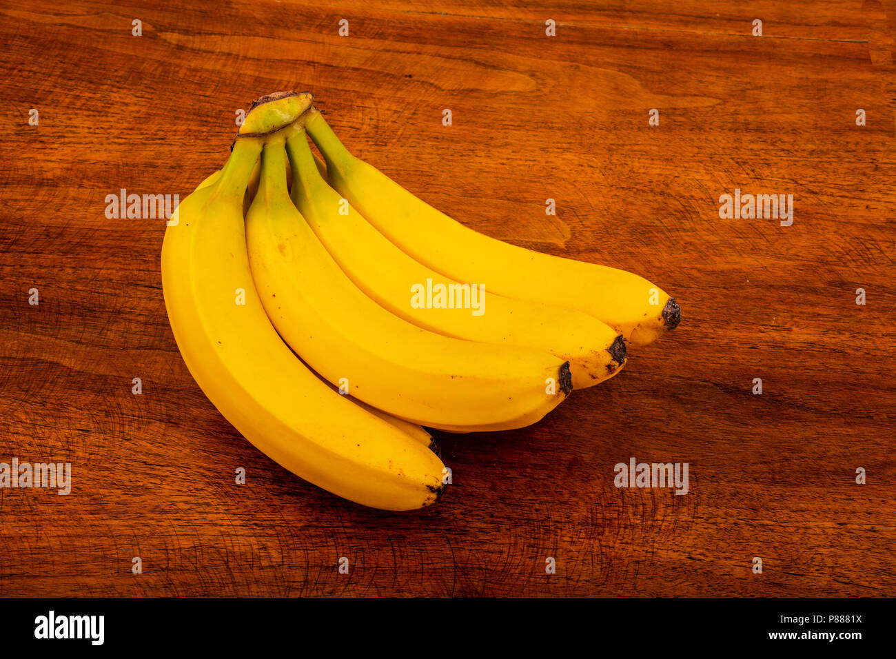 Fresh Ripe Bananas on a Wood Table Stock Photo Alamy