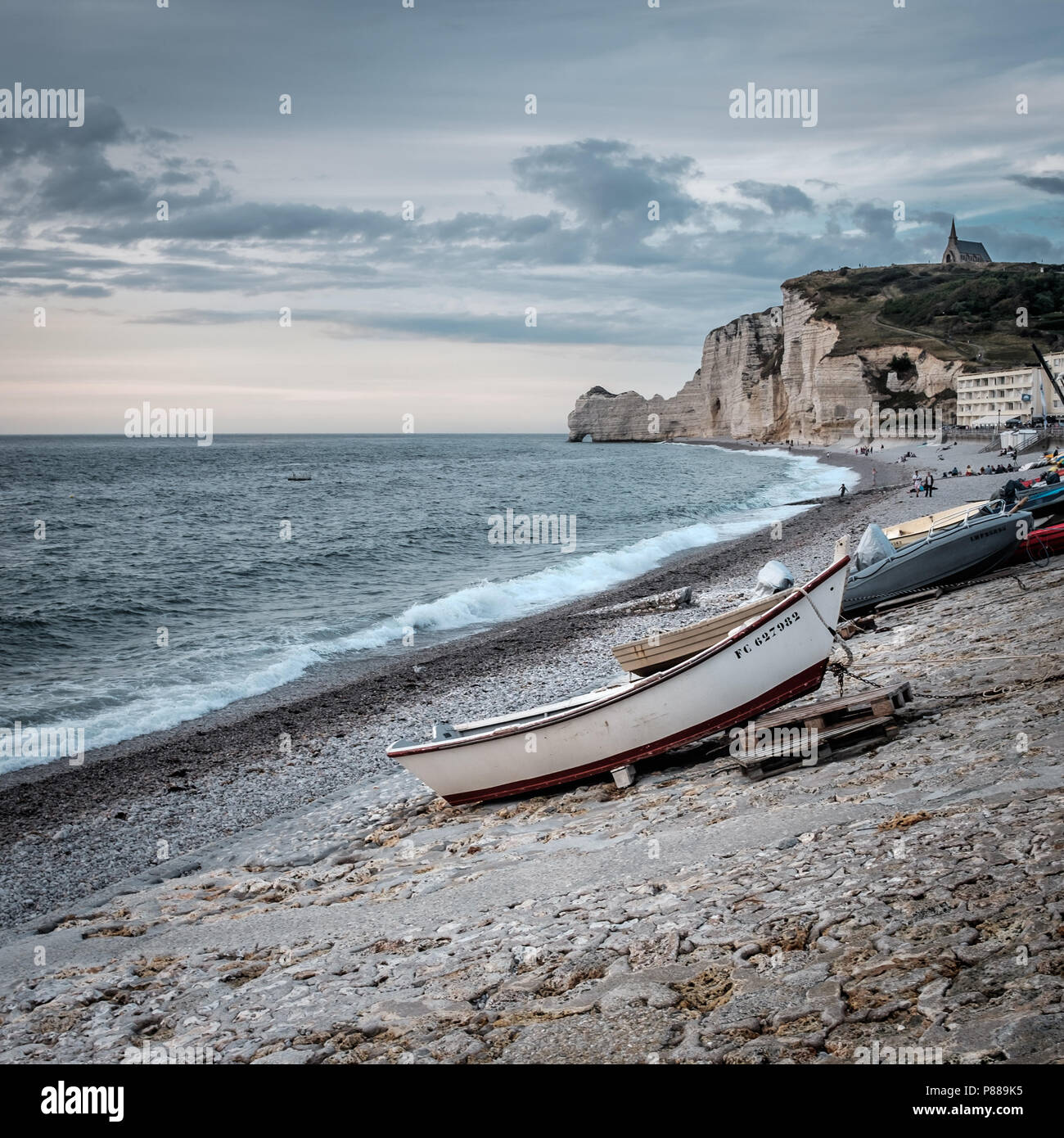 Boats on the beach of Etretat in Normandy Stock Photo - Alamy