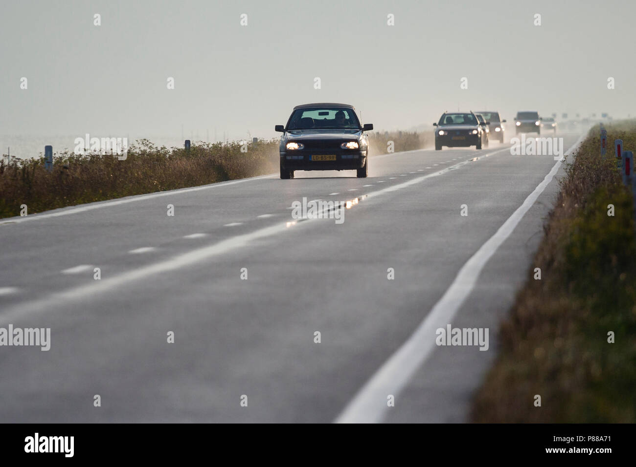 Auto's rijdend op Oostvaardersdijk, Cars driving at Oostvaardersdijk Stock Photo