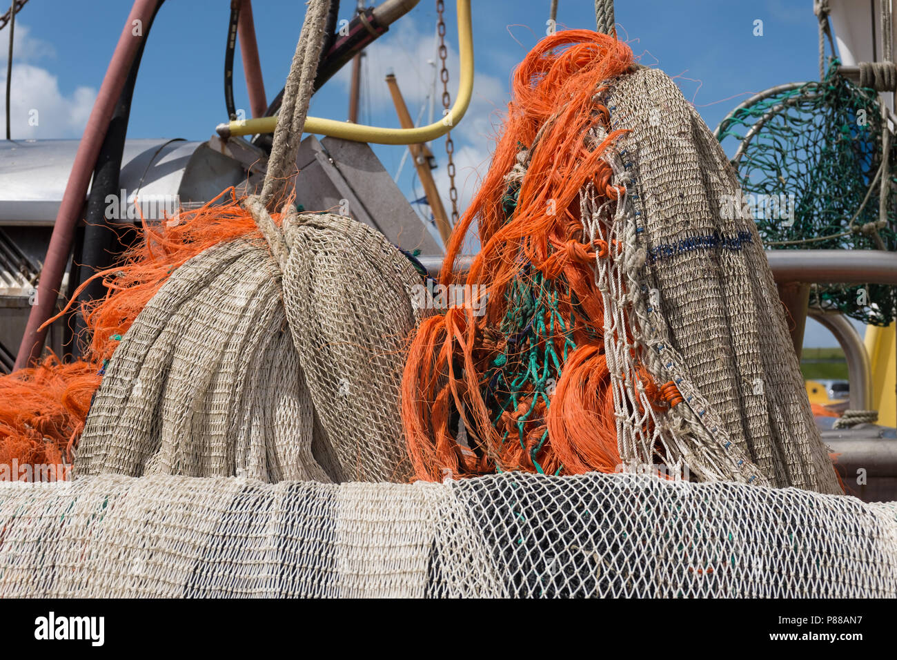 Close-up view on fishing nets in the old port of Oudeschild Stock Photo