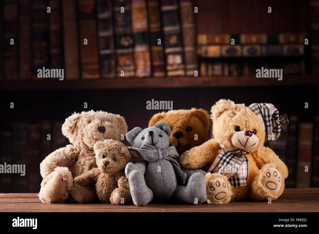 Cute teddy bears with old vintage wood background Stock Photo