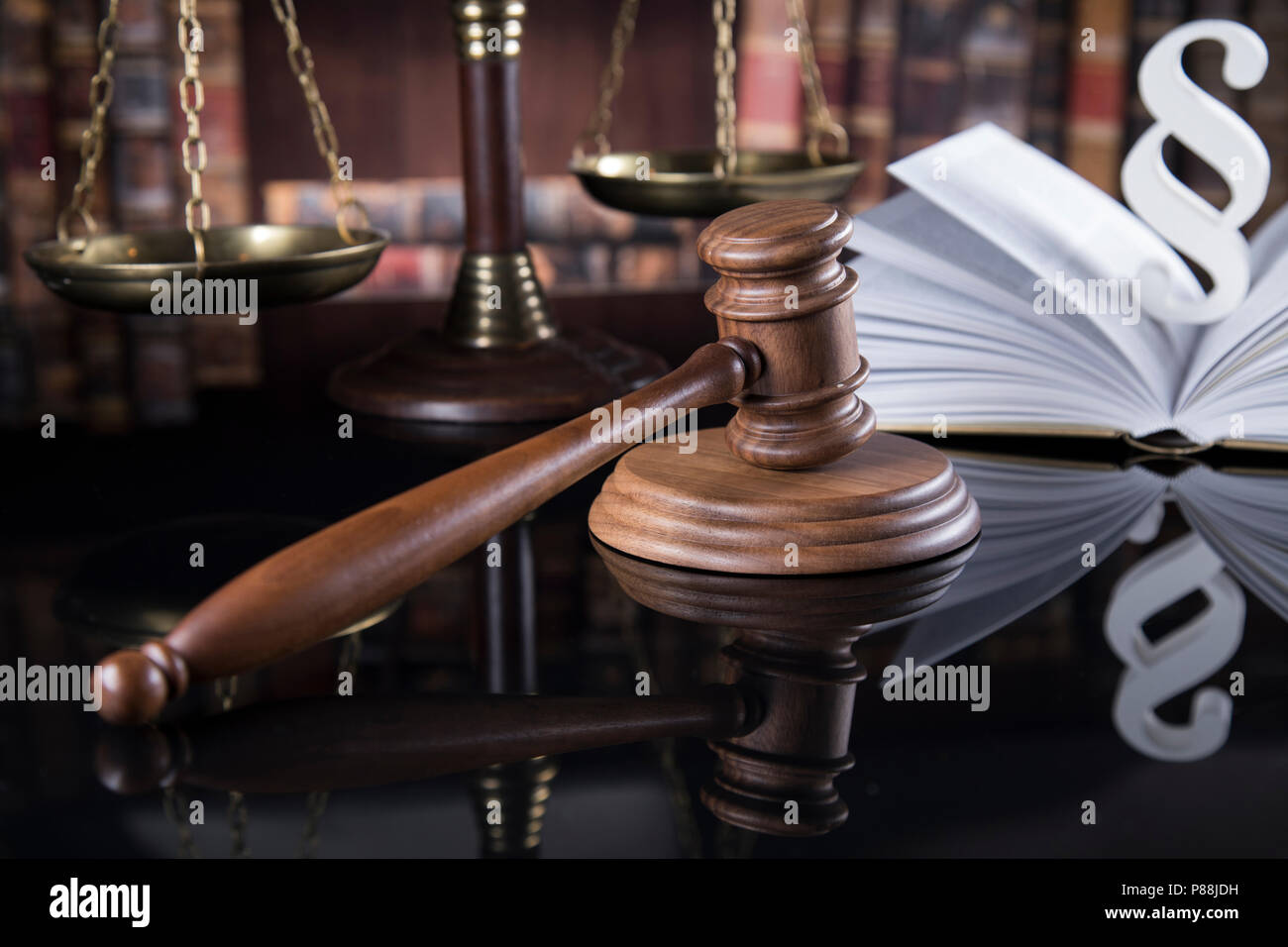 Book, Court gavel,Law theme, mallet of judge and paragraph sign Stock