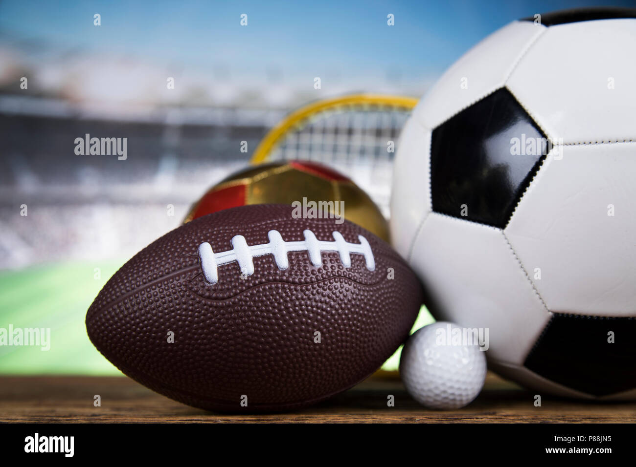 Sport equipment and balls, stadium background Stock Photo Alamy