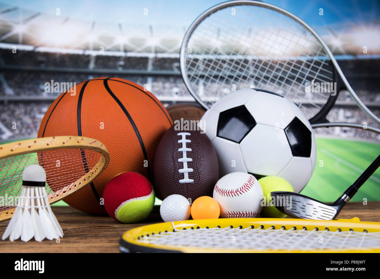 Sport equipment and balls, stadium background Stock Photo Alamy