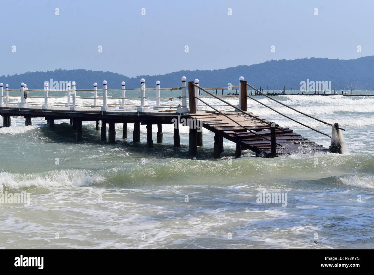 Pier in the middle of the high tide sea - Ko Rong Sanloem, Cambodia Stock Photo