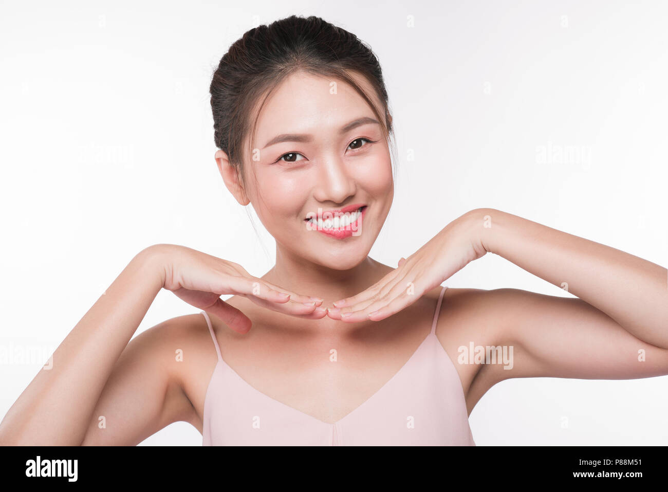 Beautiful female asian face with natural perfect skin Stock Photo