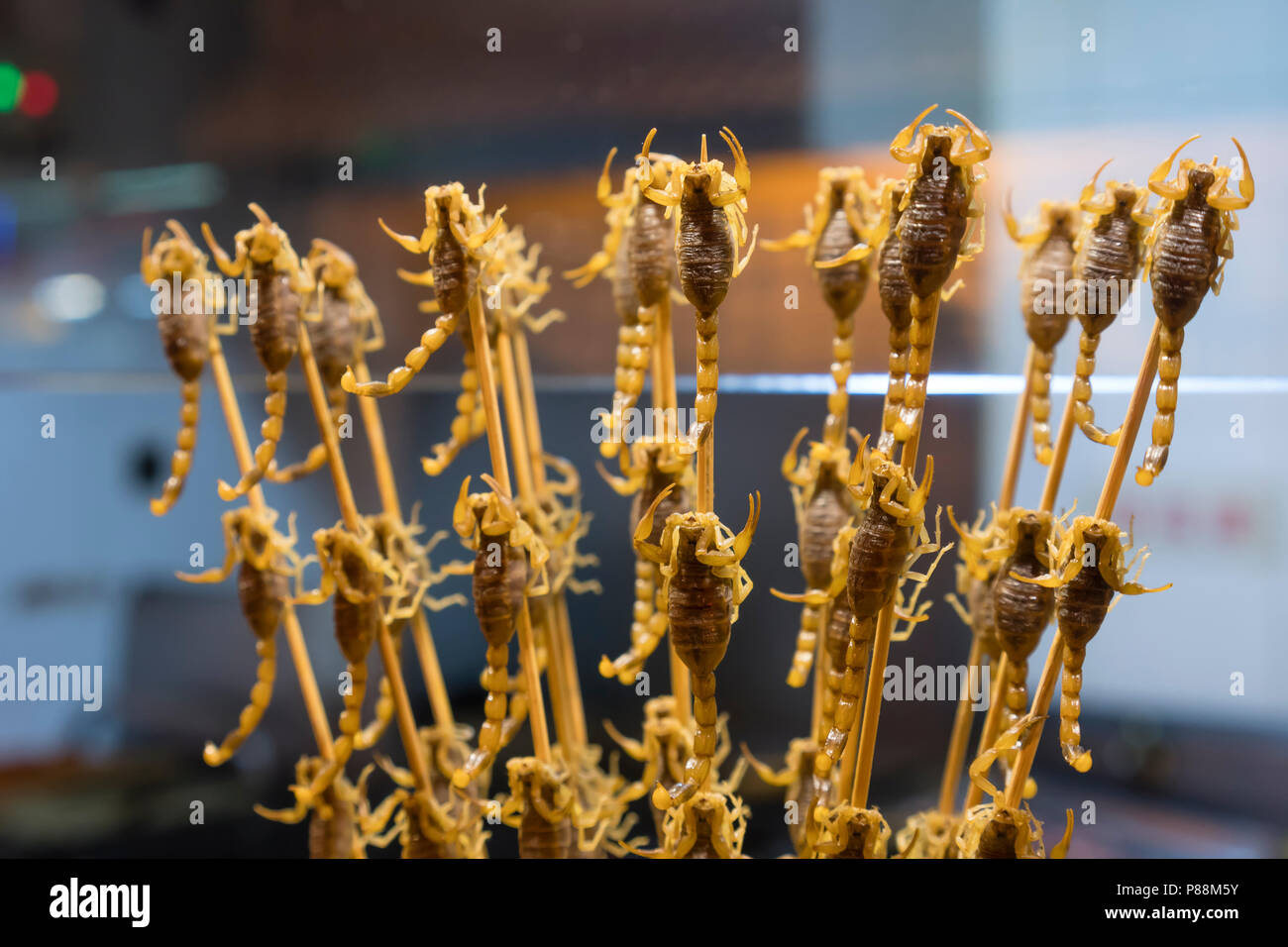 Fried scorpion for sale at a food stall in China Stock Photo