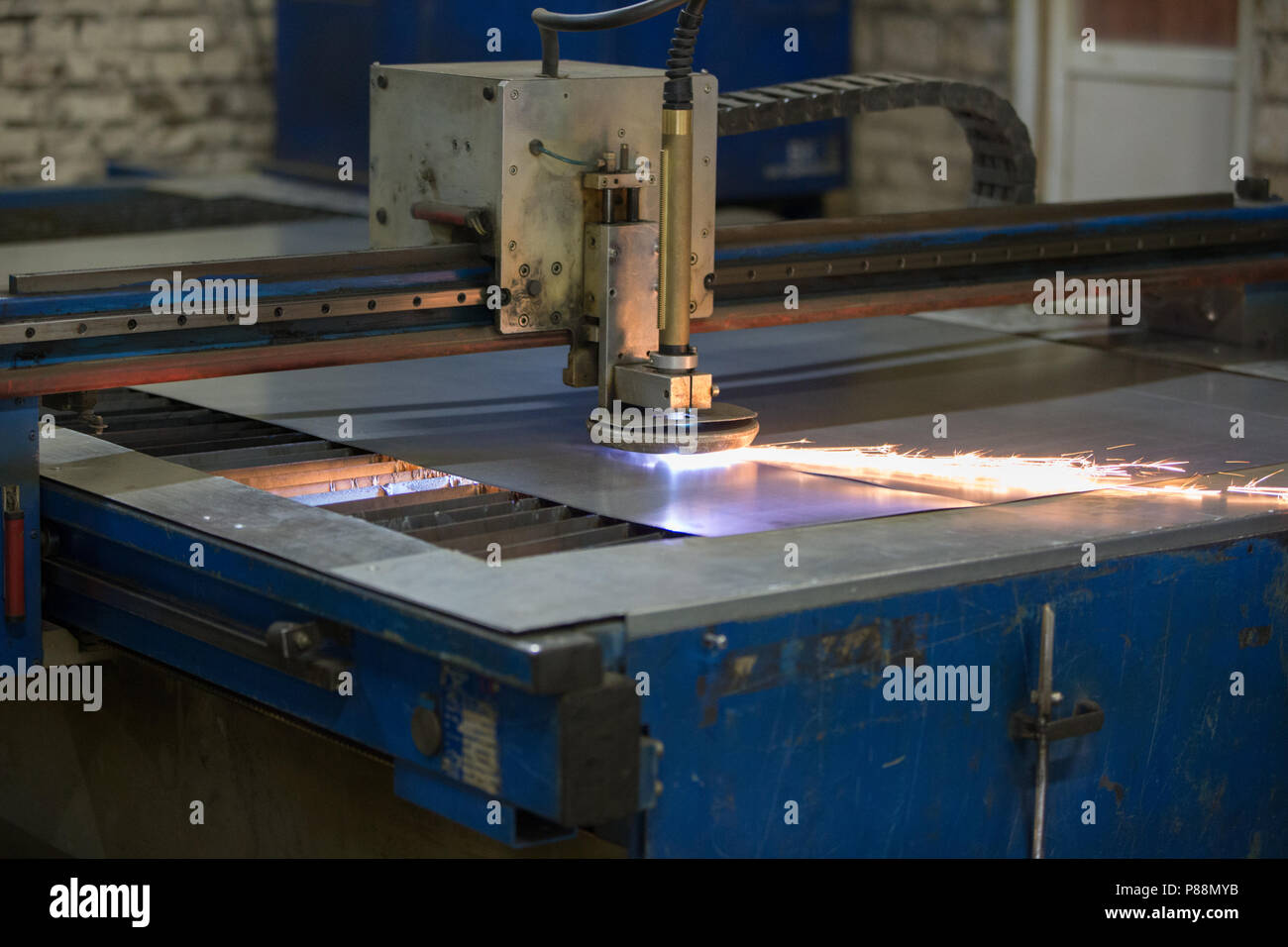 Plasma cutting of metal.Cutting of metal. Sparks fly from laser Stock