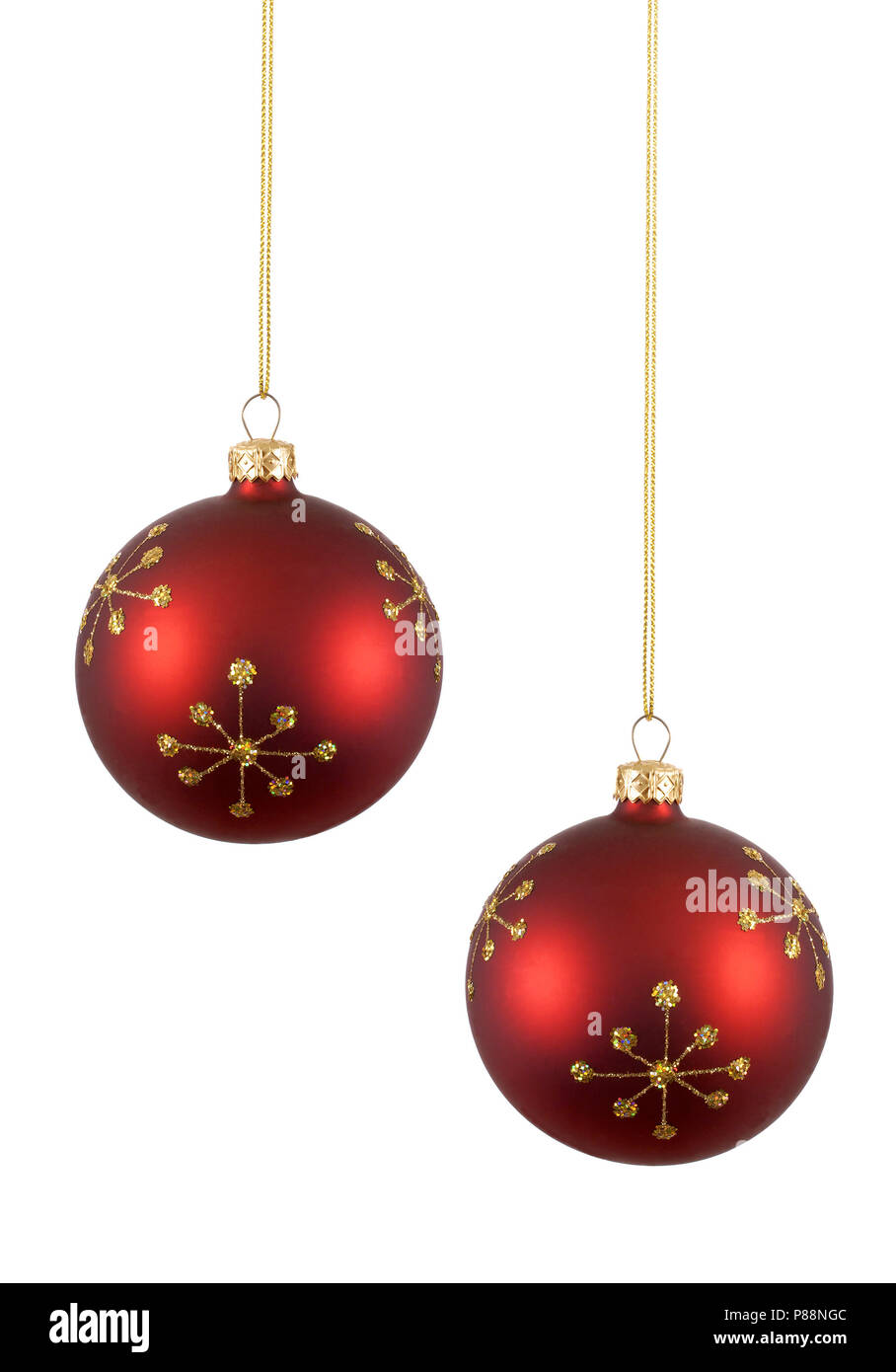 two red christmas balls or baubles with gold snowflake pattern isolated against white background - Red Christmas Balls two red christmas balls or baubles with gold snowflake pattern isolated against white background - Red Christmas Balls
