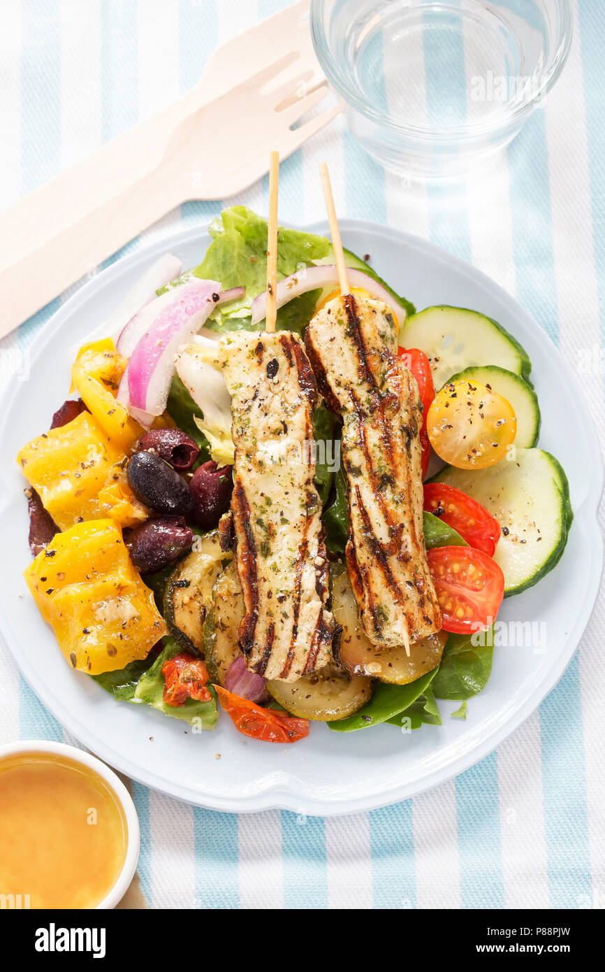 Mediterranean halloumi salad. Marinated chargrilled halloumi, cucumber