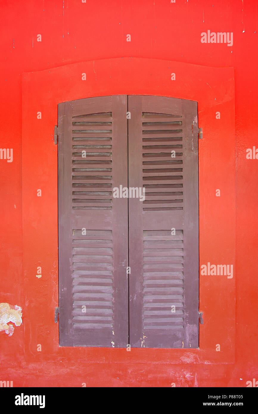 the window on red wall Stock Photo - Alamy