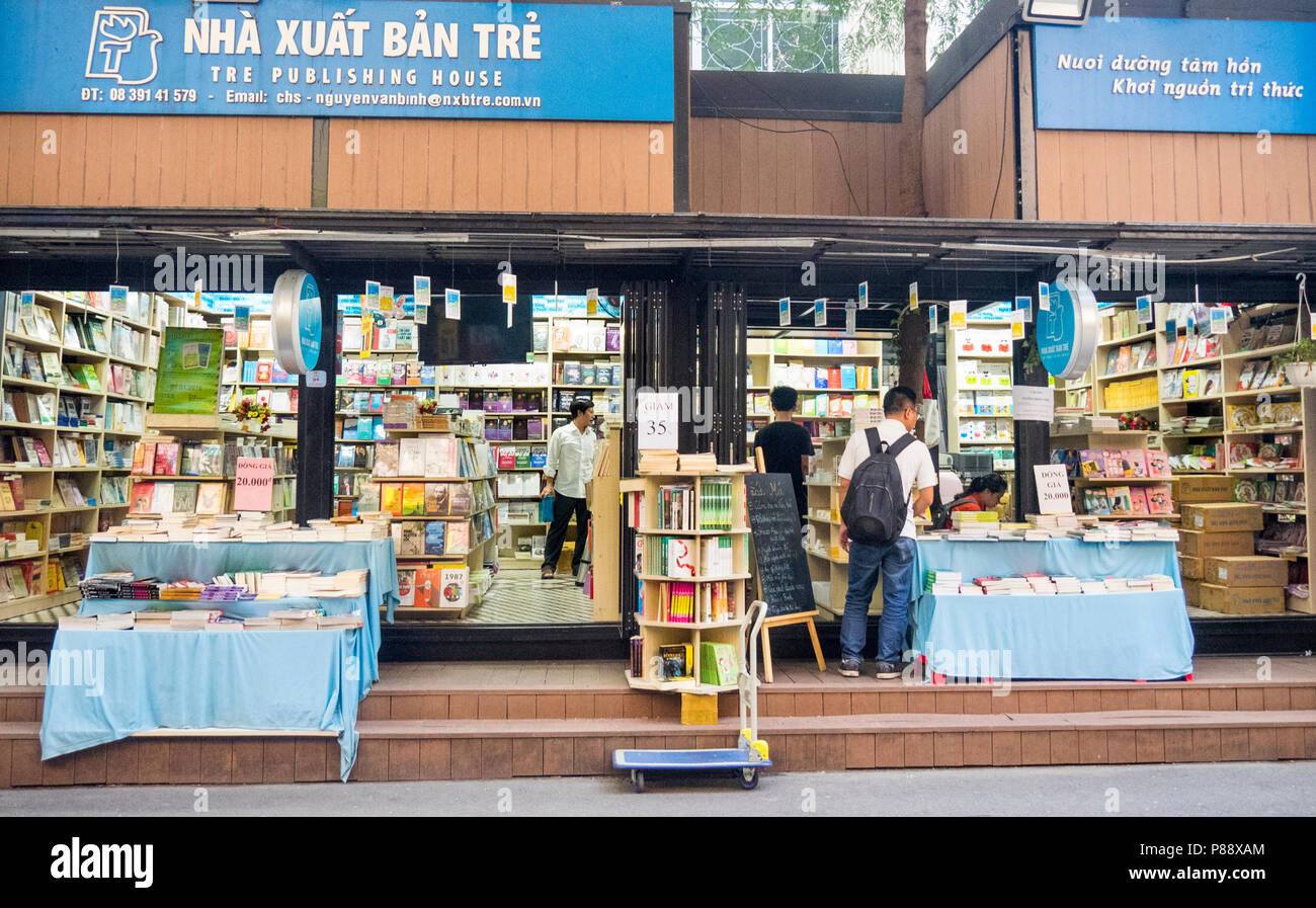 Vietnamese people browsing in a bookstore in Book Street, Ho Chi Minh