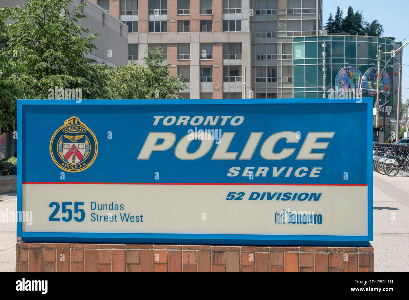 Sign outside Toronto Police Services 52 division, a busy police station in downtown Toronto 