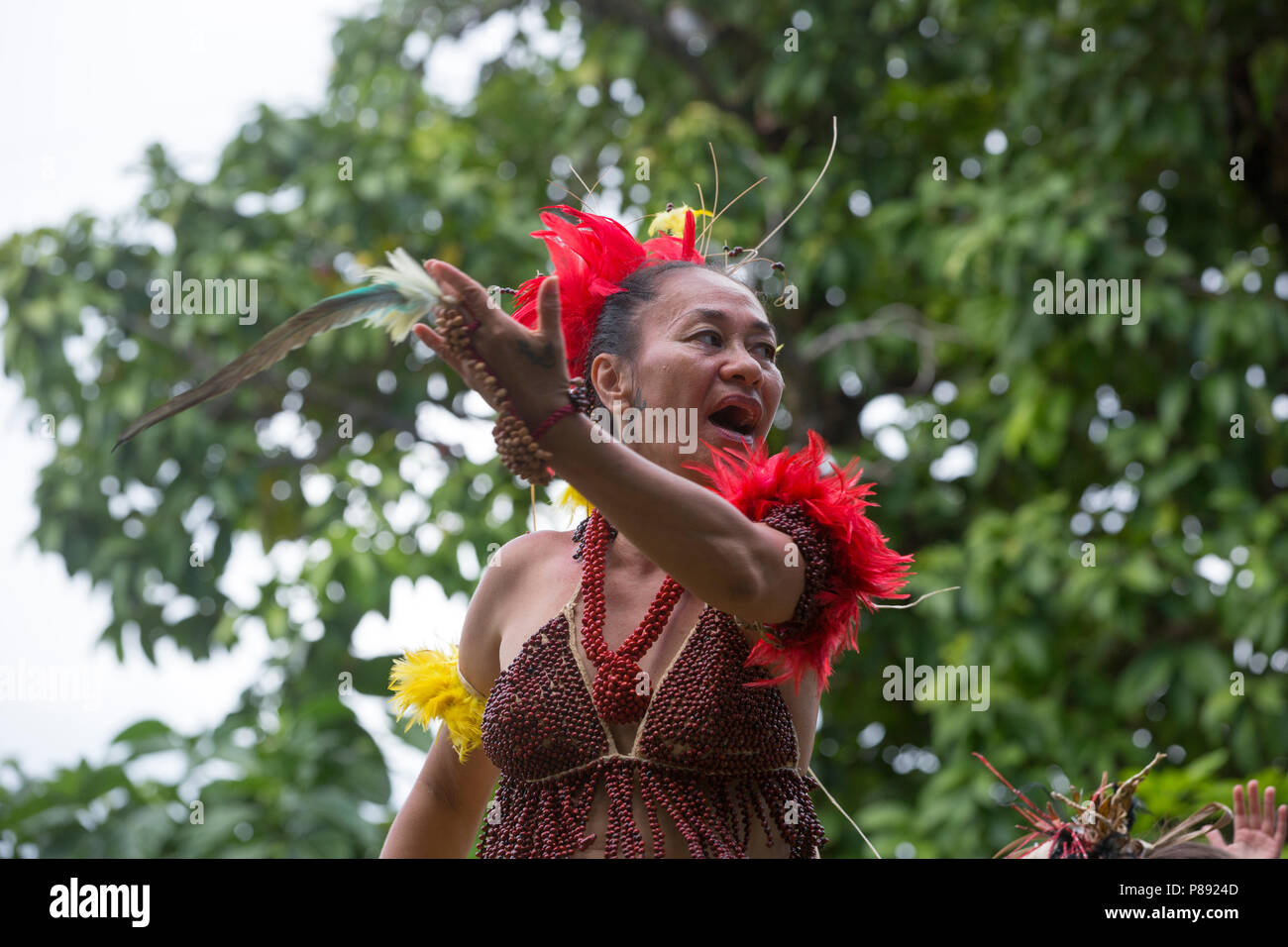 Marquesas Woman singing Stock Photo