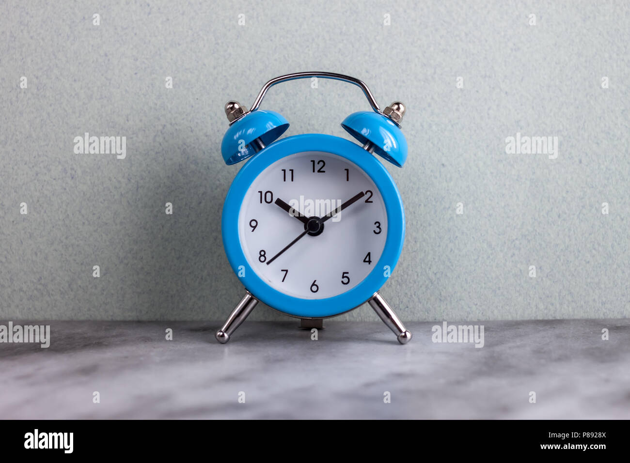 blue alarm clock retro style Stock Photo Alamy