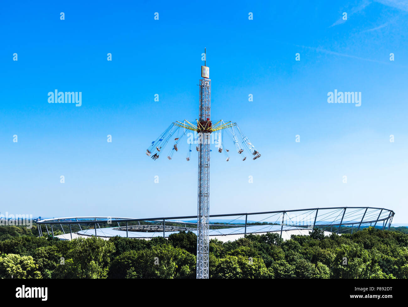 Hannover, Germany, July 7., 2018: Giant chain carousel with a height of 60 meters in front of the stadium HDI-Arena, blue sky Stock Photo