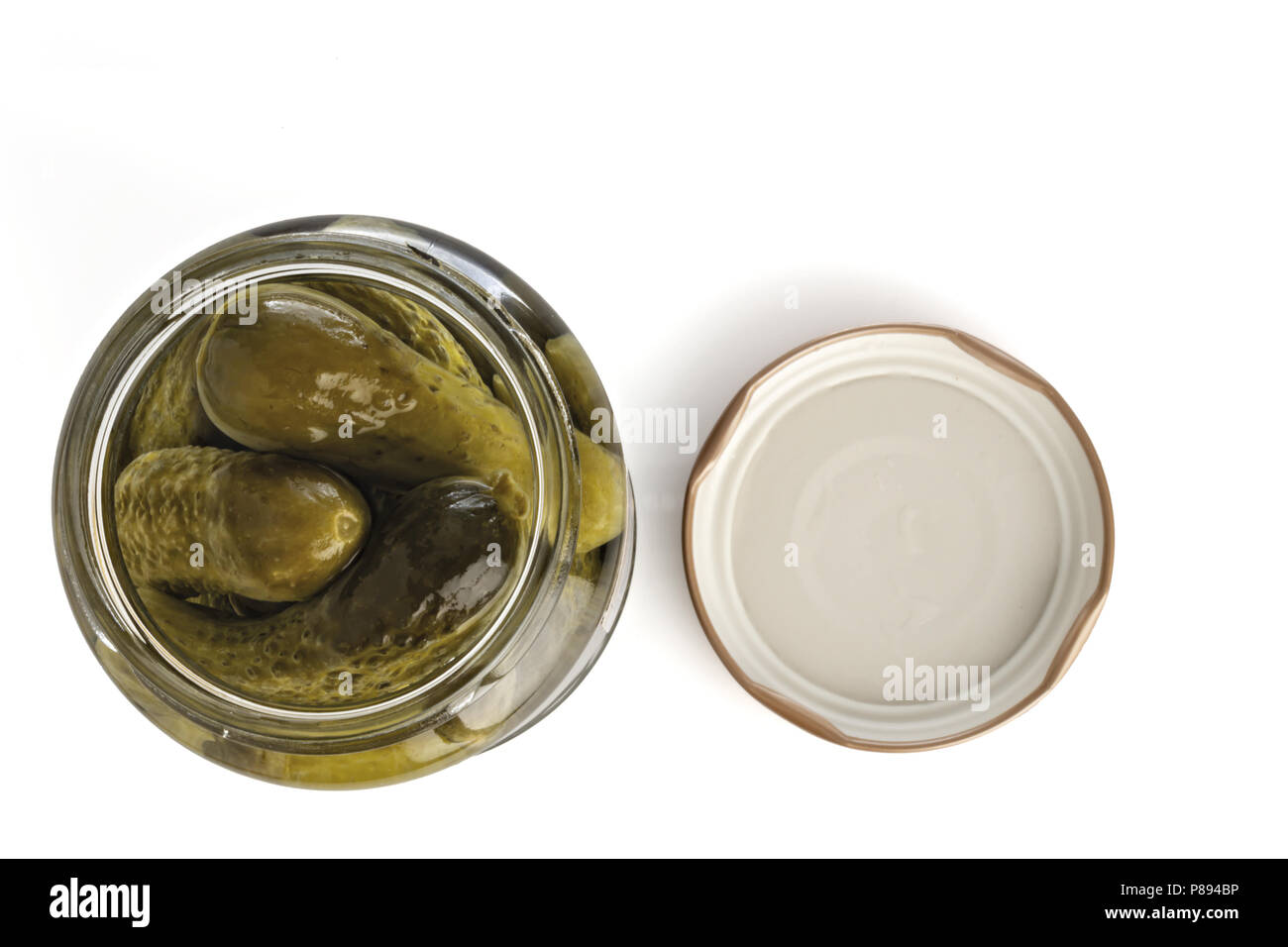 pickled gherkins in open jar from above Stock Photo Alamy