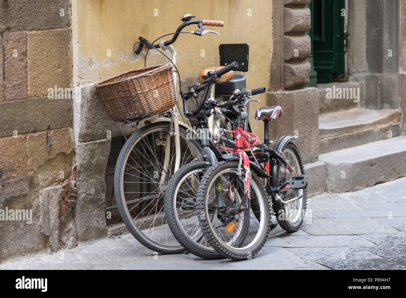 Bicycles suitable for all the family, old city street of Lucca, Tuscany, Italy, Europe, Stock Photo