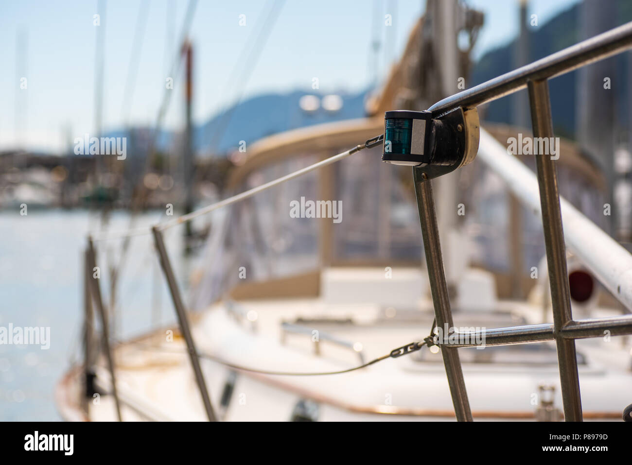 Starboard signal light on a small fishing boat. Stock Photo