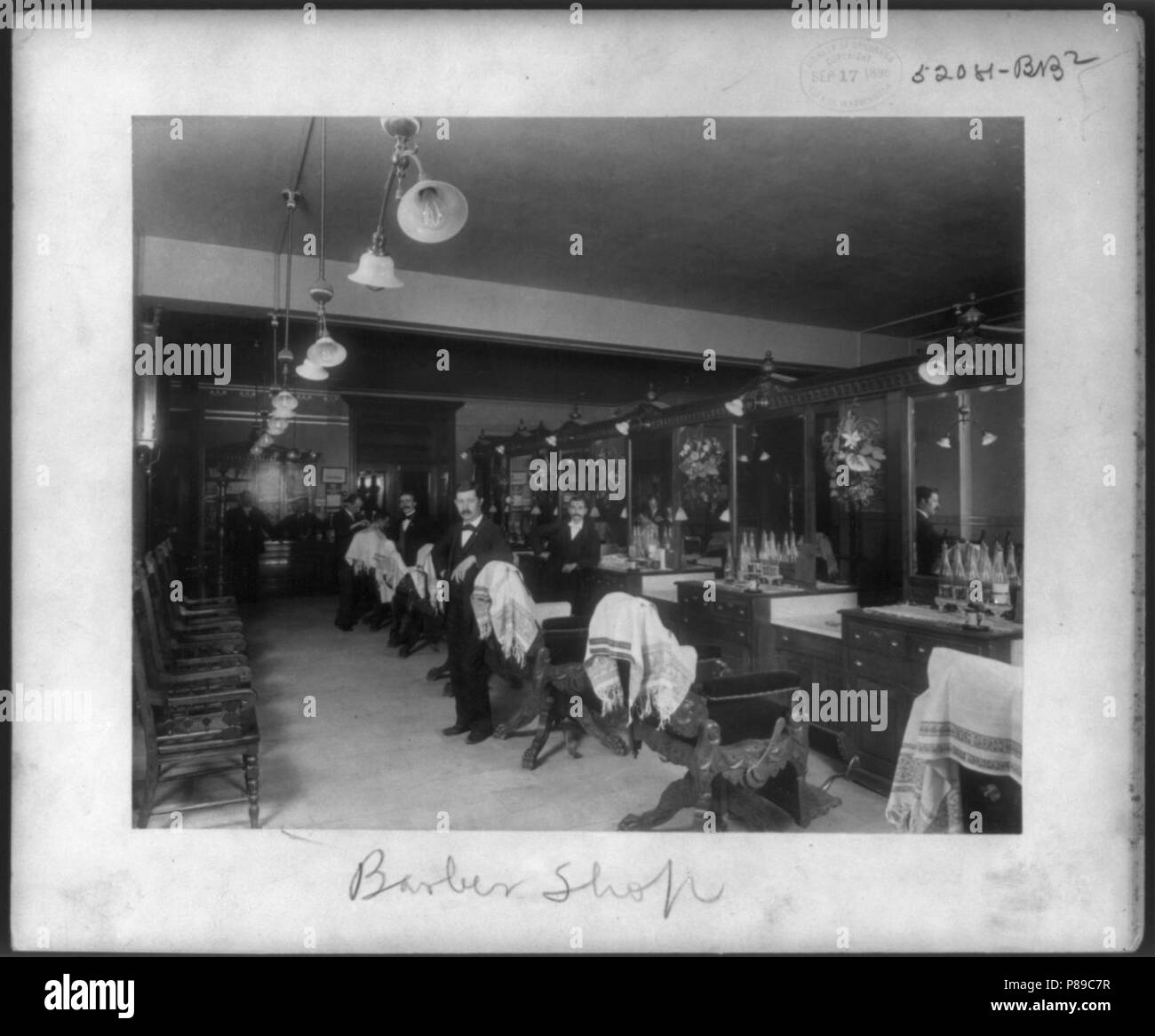7 men in a barber shop, Philadelphia, Pa Stock Photo Alamy