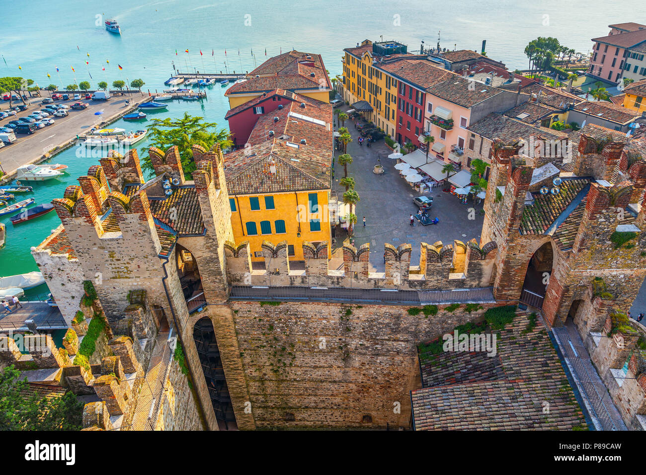 The Italian town of Sirmione. View from the tower of the castle of ...