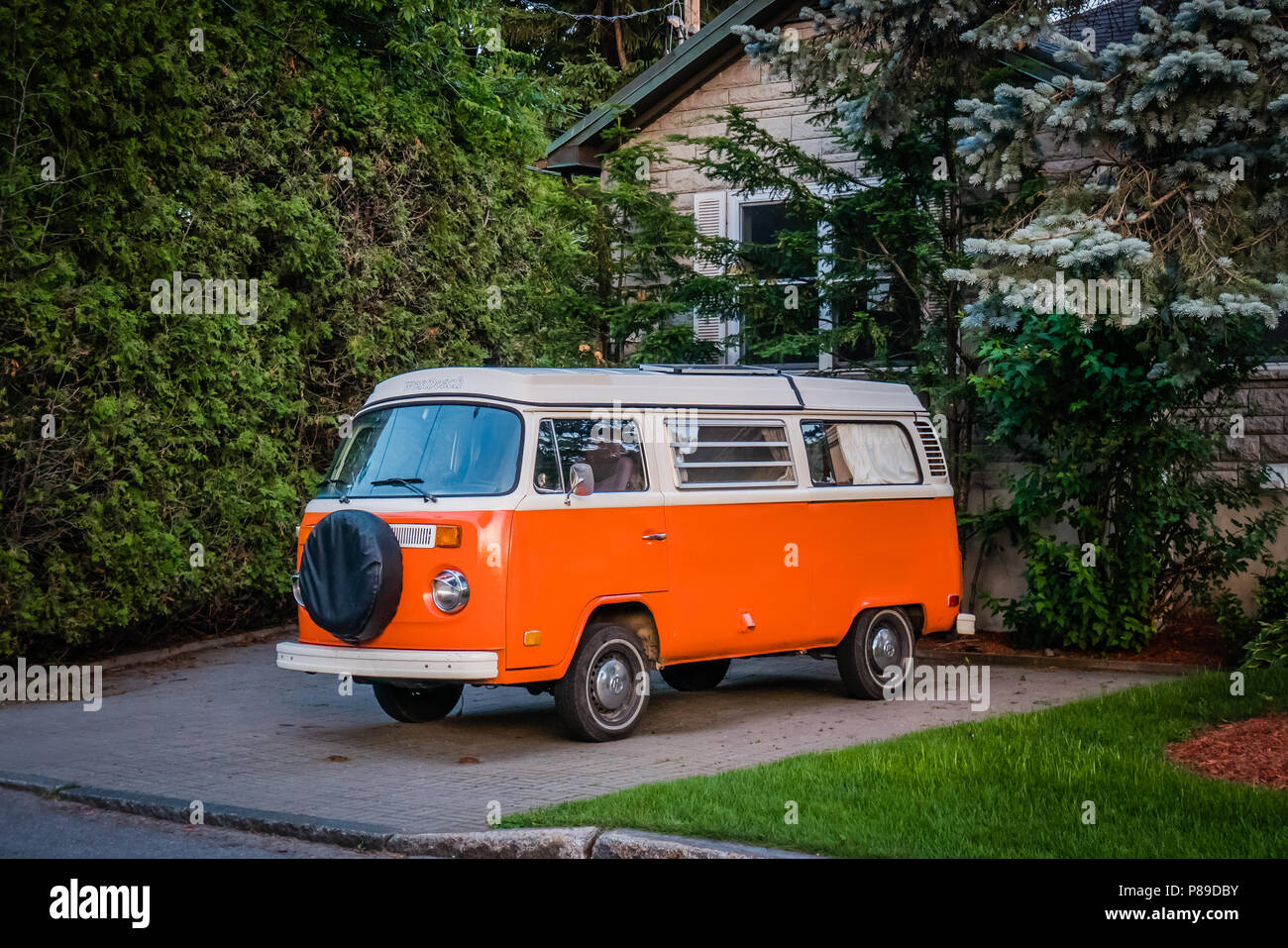 orange volkswagen type 2 camper van Stock Photo