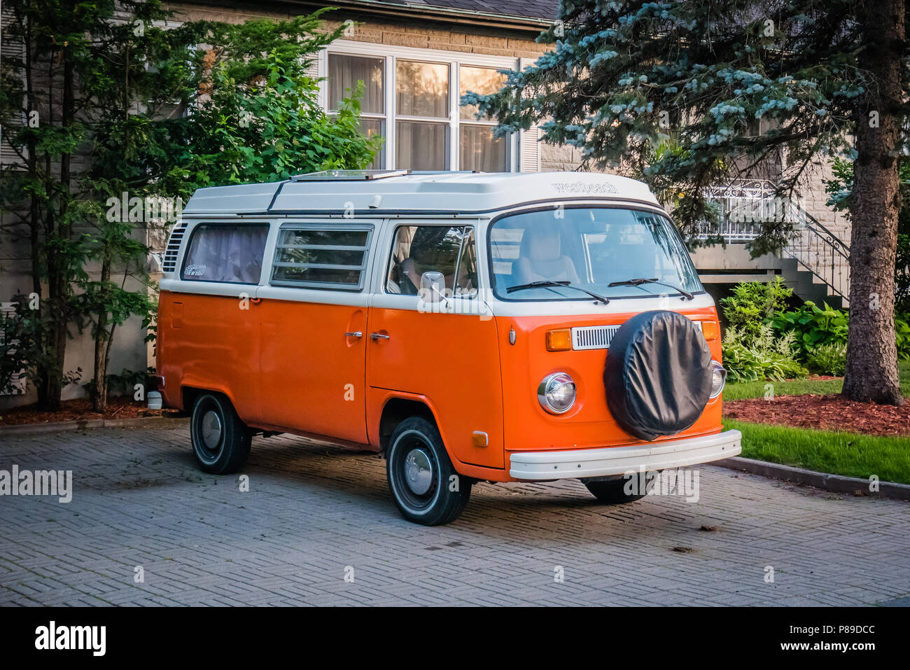 orange volkswagen type 2 camper van Stock Photo