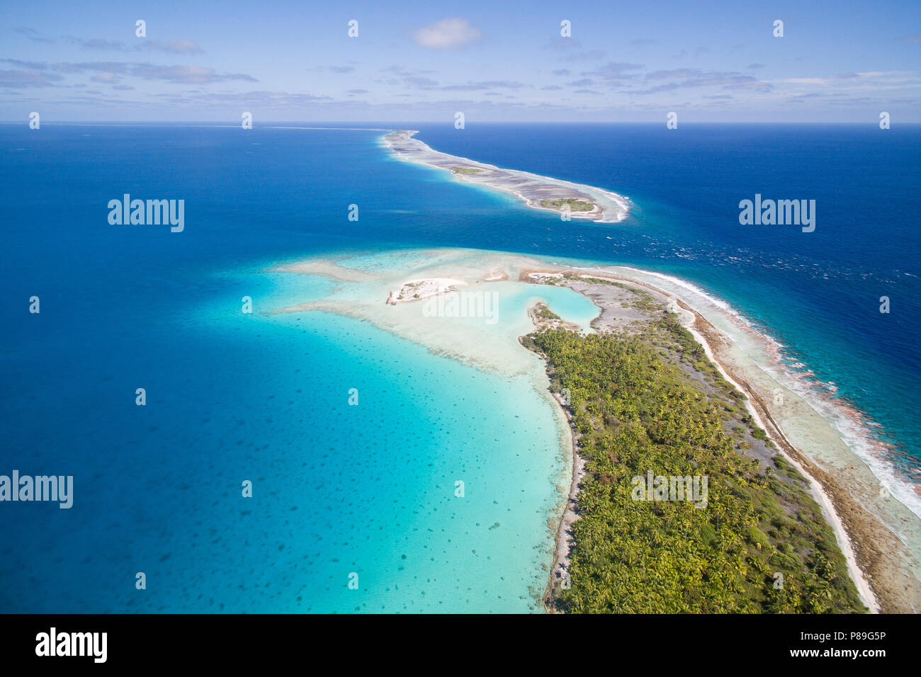 Aerial of Tahanea Atoll entrance, French Polynesia Stock Photo