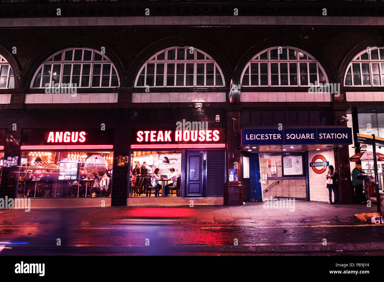 LONDON, UK - March 12 2018: Angus Steak Houses restaurant near Leicester Square Station. Night scene London, UK Stock Photo