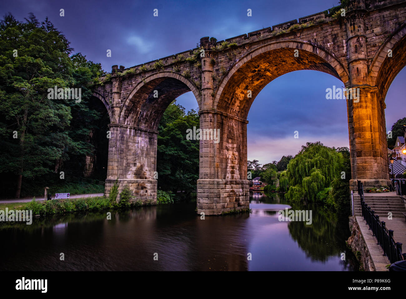 The River Nidd runs through Knaresborough - scene at sunset on the river. Stock Photo