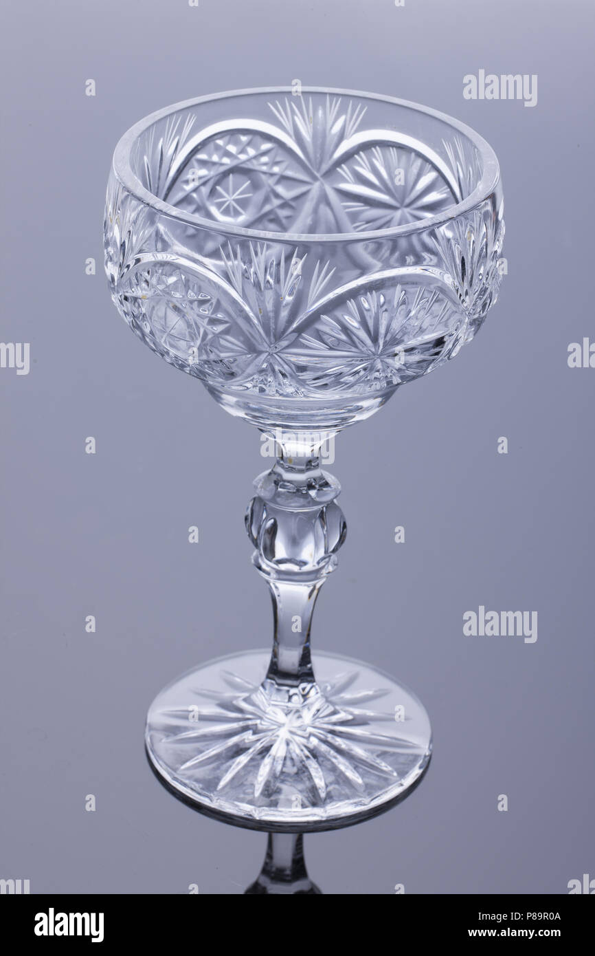 Crystal vase on a glass studio background Stock Photo - Alamy