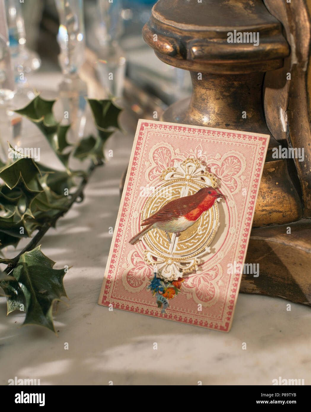 Picture of robin on old fashioned Christmas card Stock Image