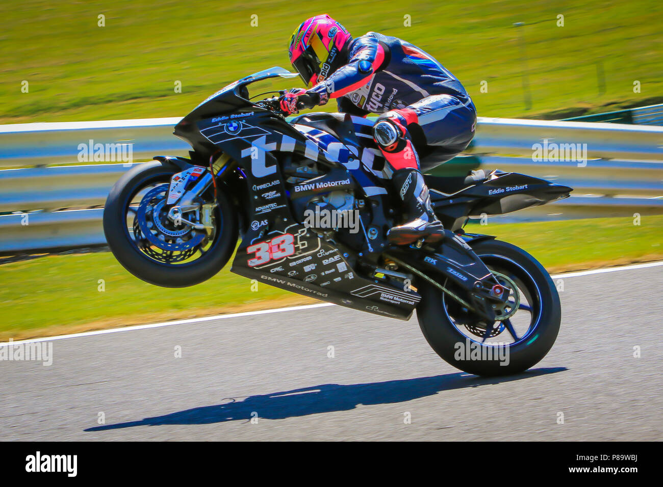 Jumping the mountain at Cadwell Park Stock Photo