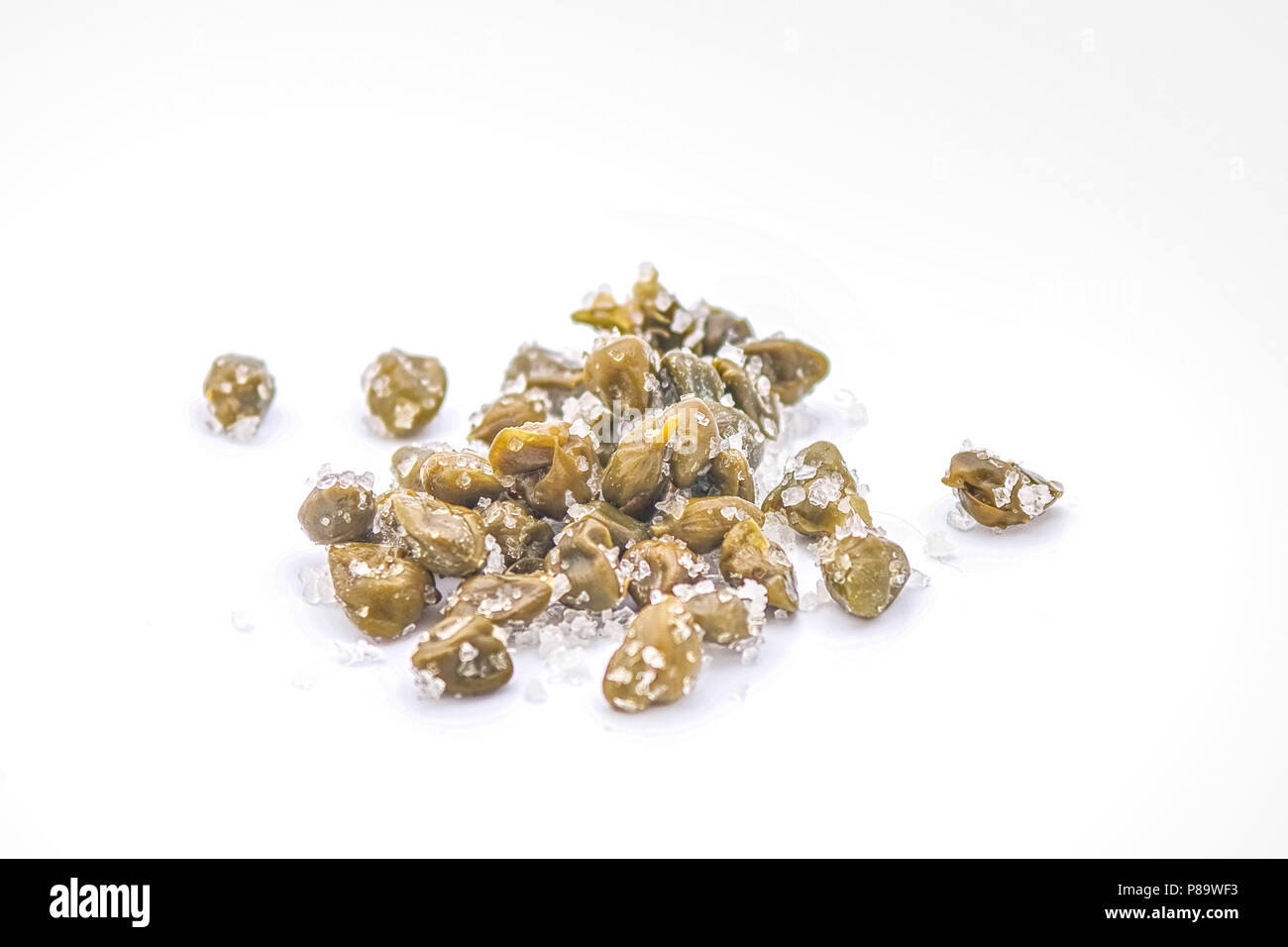 Capers preserved in salt Stock Photo Alamy