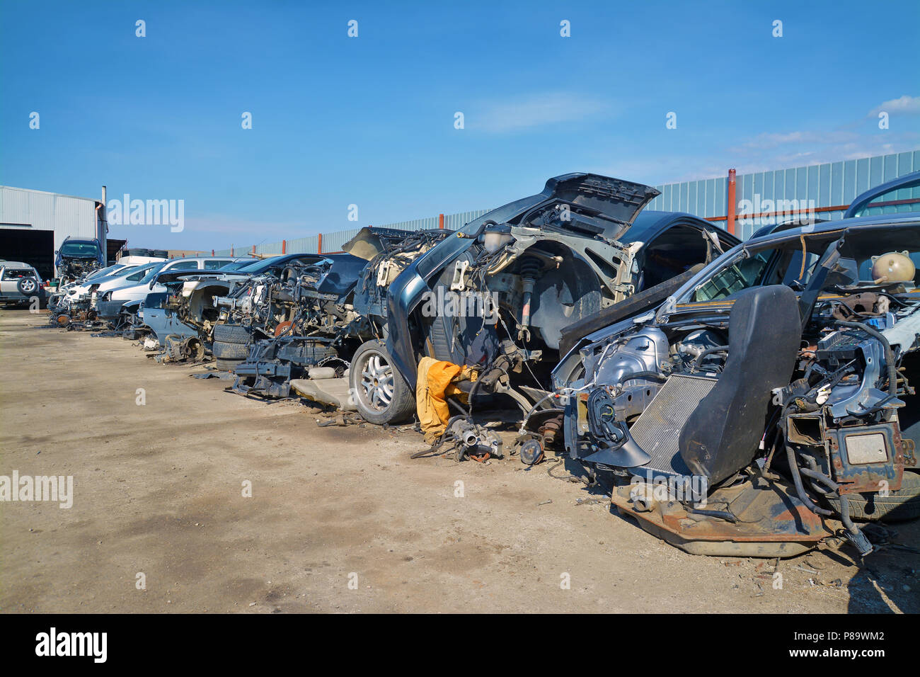 car parts and scrap in a junkyard Stock Photo Alamy