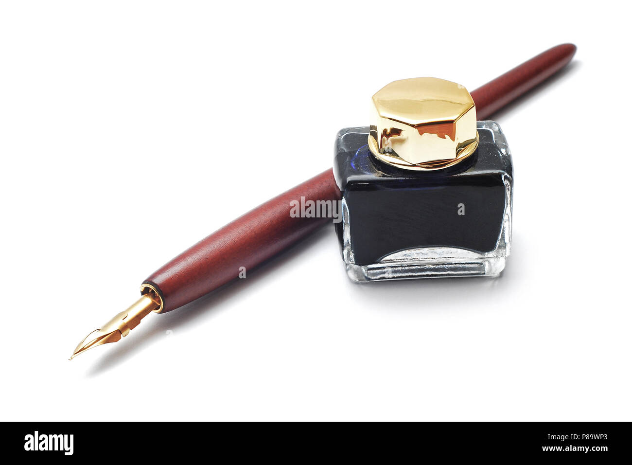 quill and inkwell isolated on white background Stock Photo - Alamy