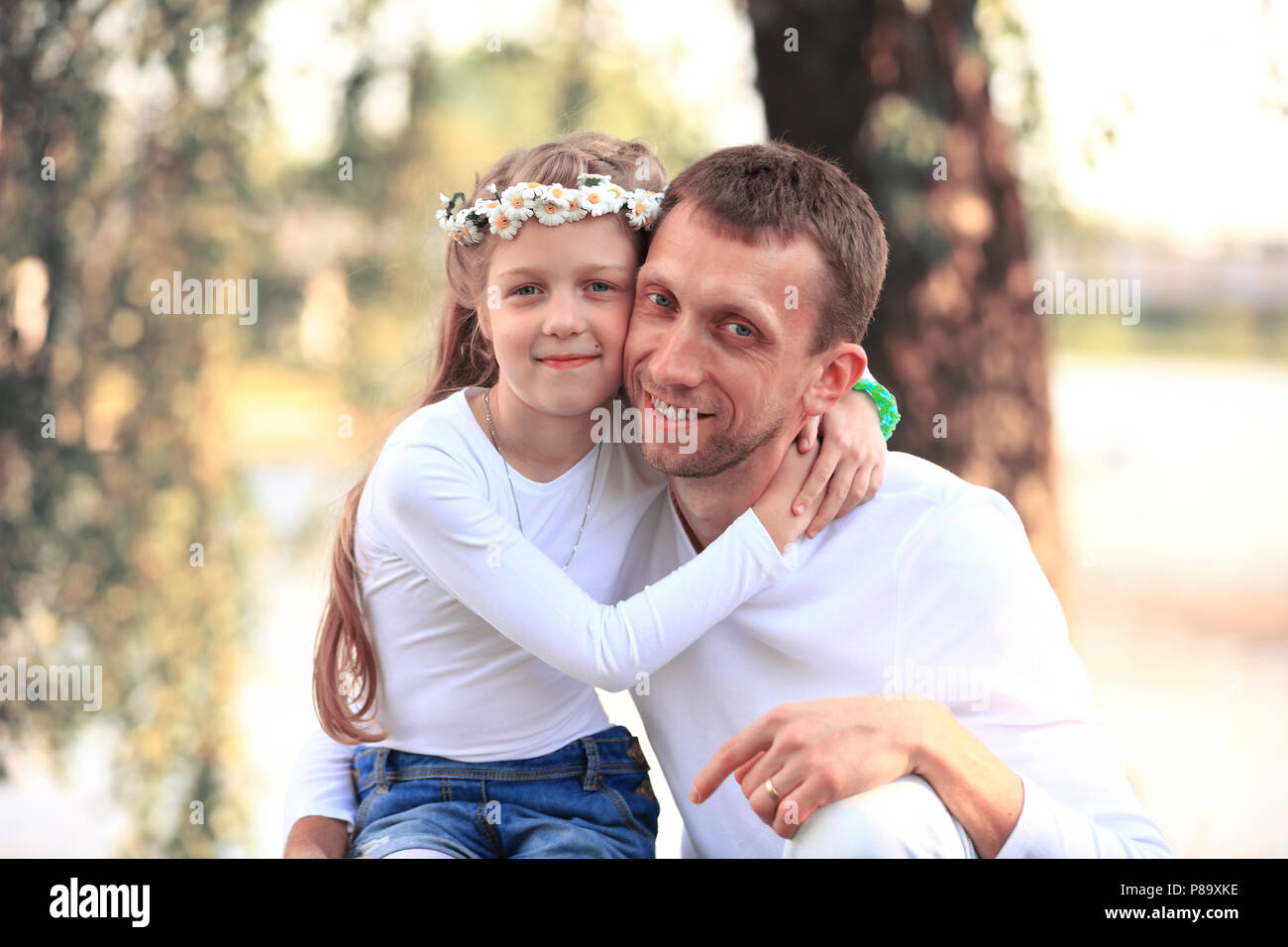 Happy father with daughter in summer park Stock Photo - Alamy