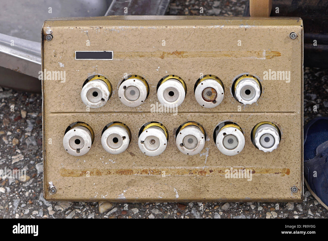 Old electric box panel with ceramic circuit breakers Stock Photo