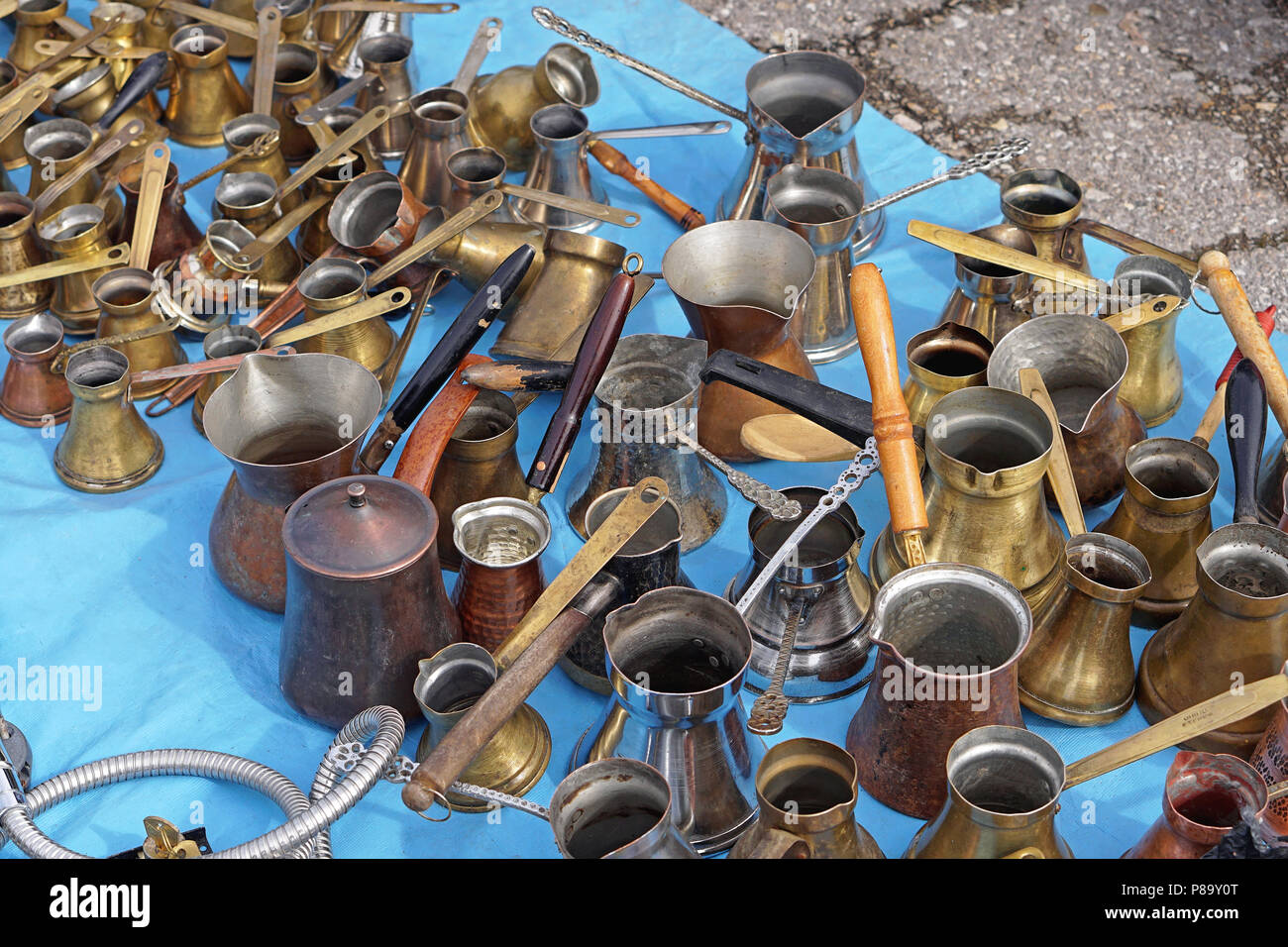 Very old style used copper coffee pots Stock Photo