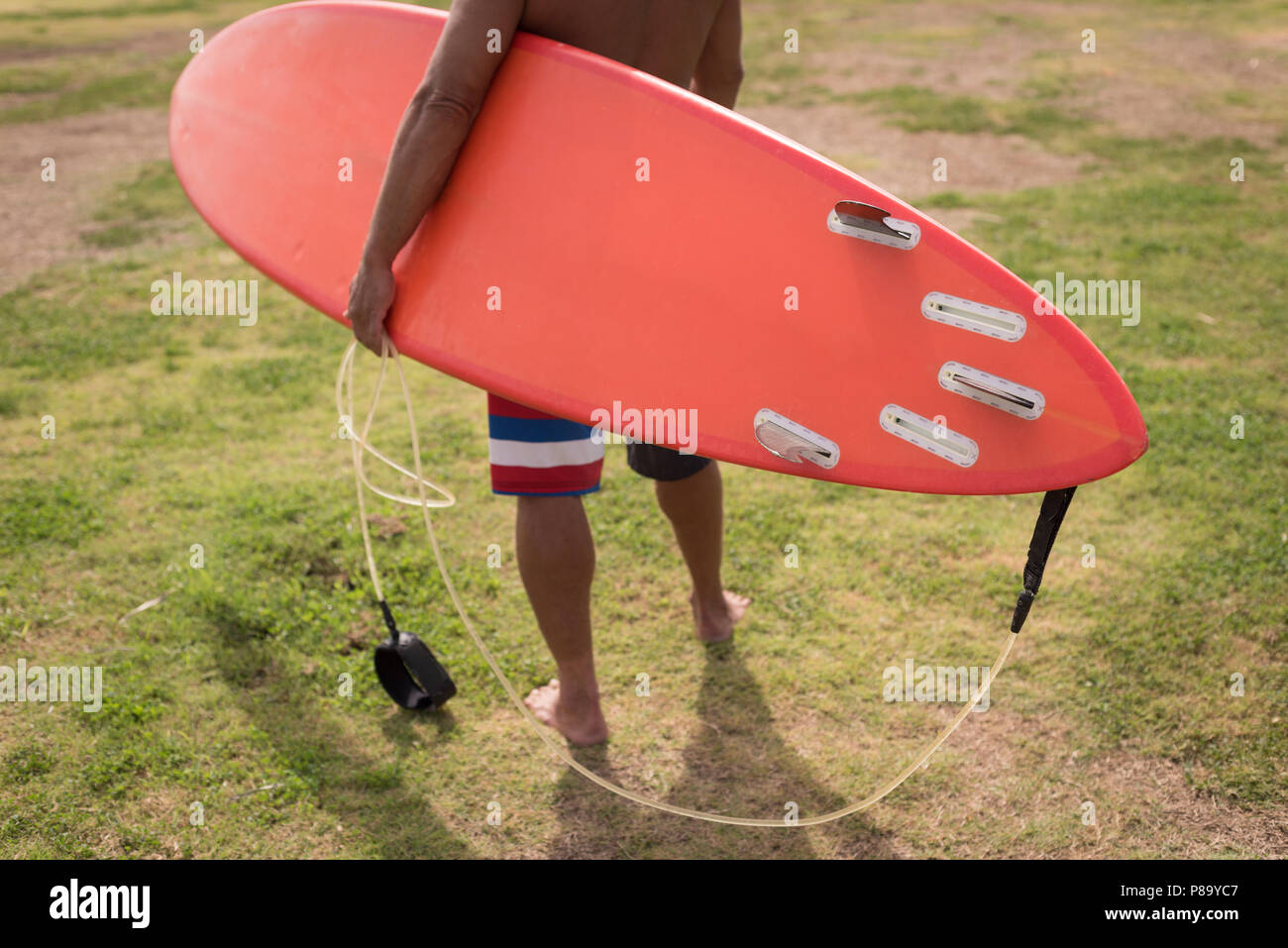 Mature male surfer standing hi-res stock photography and images - Alamy