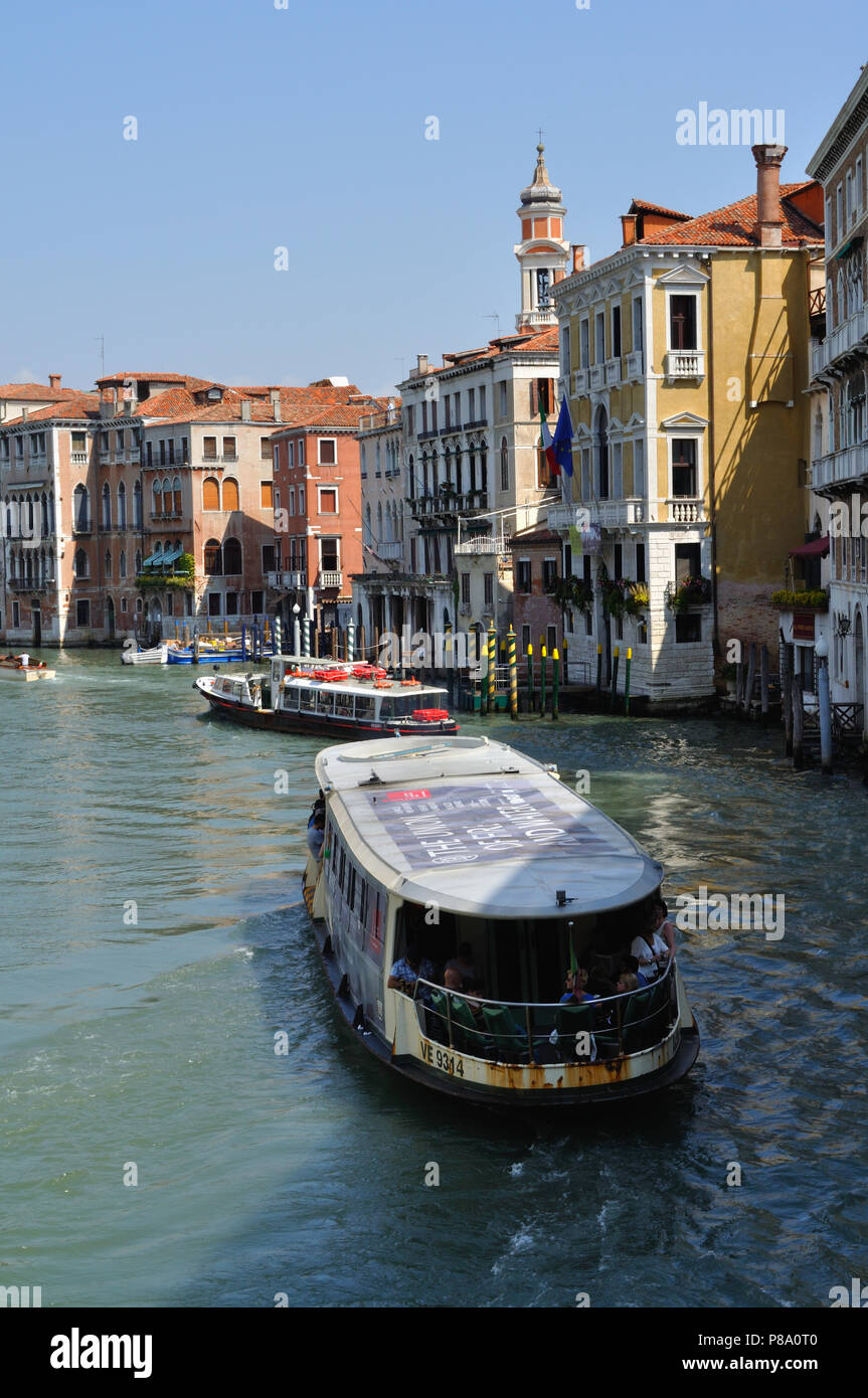 Water buses, or vaporetti, on the Grand Canal in Venice Stock Photo
