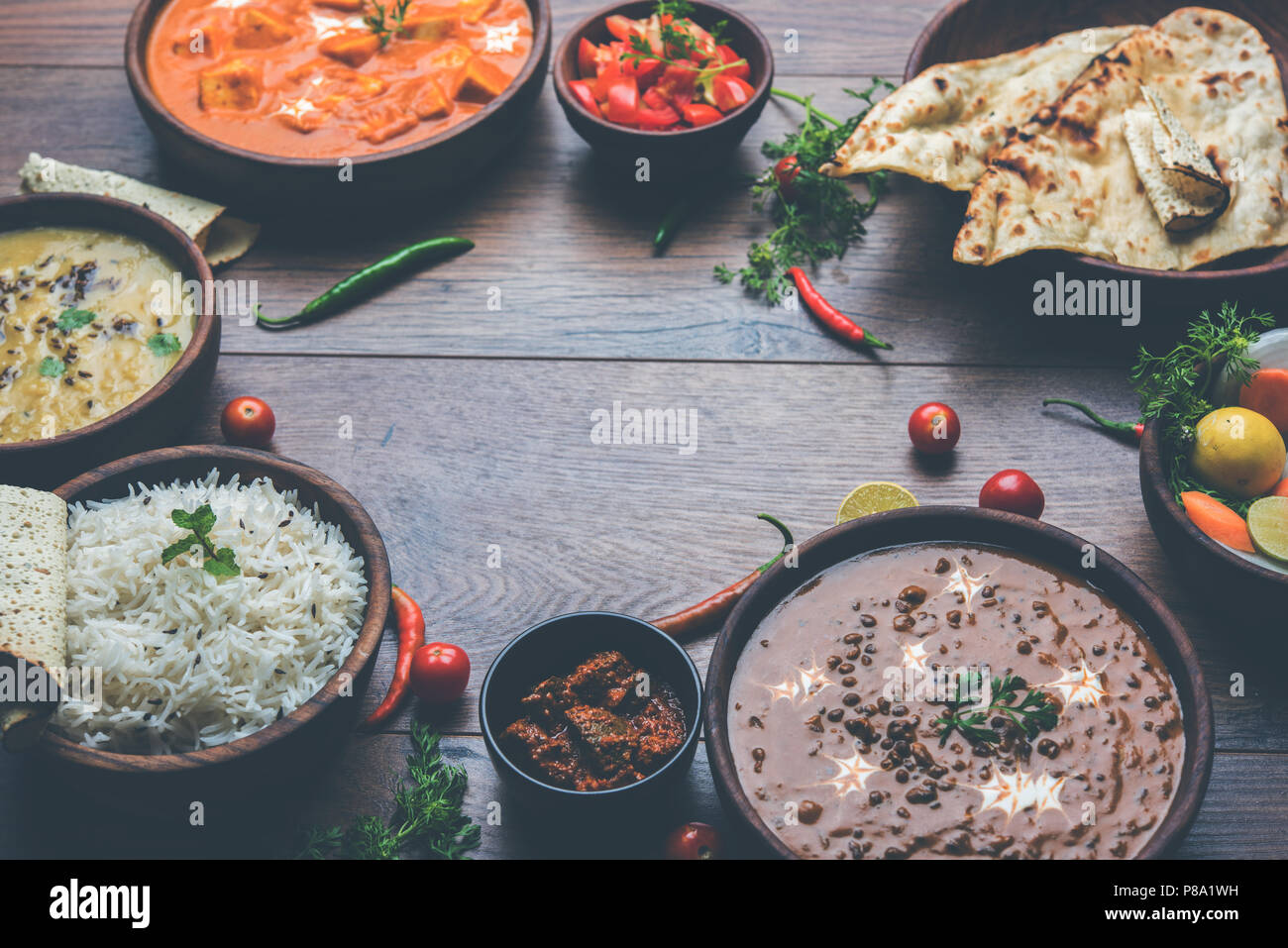 Assorted indian food for lunch or dinner, rice, lentils, paneer, dal