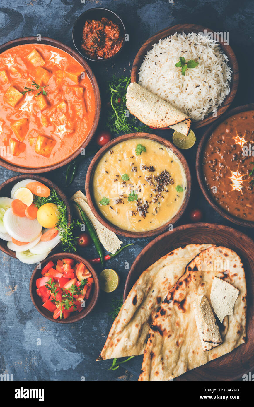 Assorted indian food for lunch or dinner, rice, lentils, paneer, dal