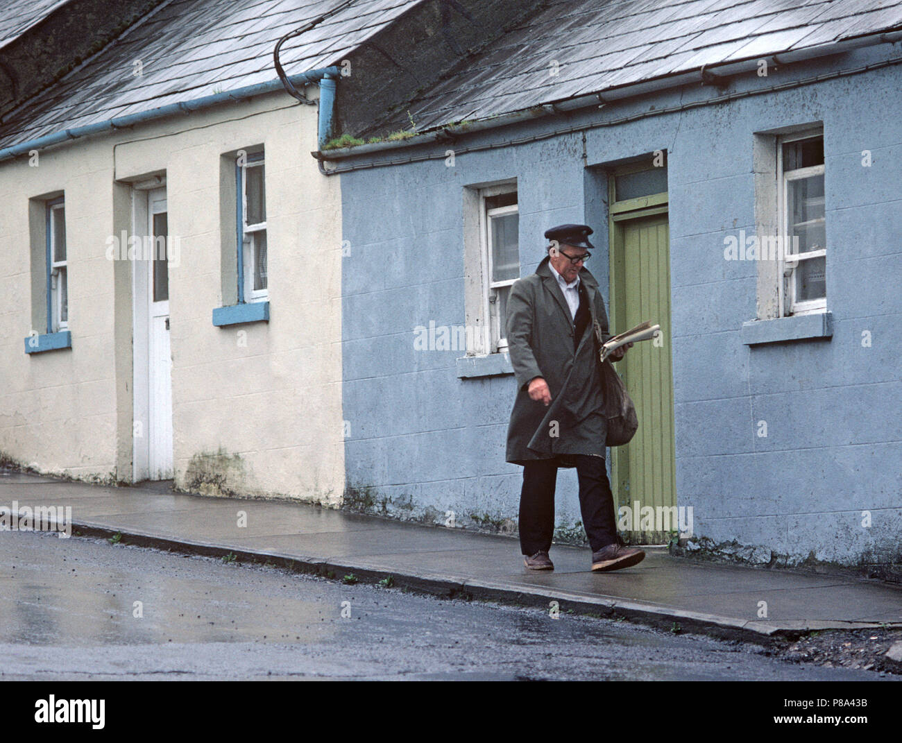 Postman in Castlebar, Co Mayo, Ireland Stock Photo - Alamy