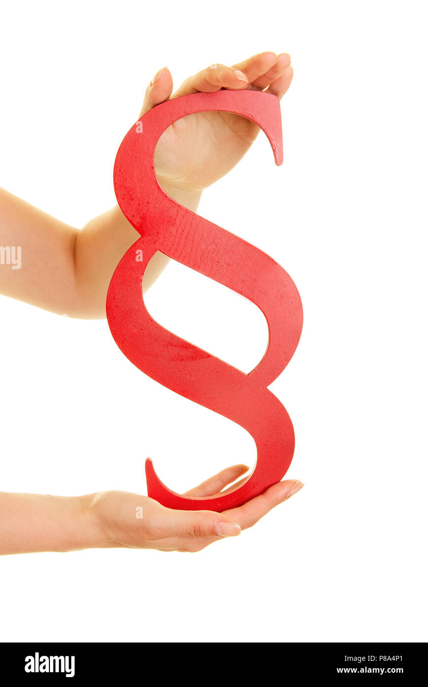 Law and Law Concept with hands and a big red paragraph Stock Photo