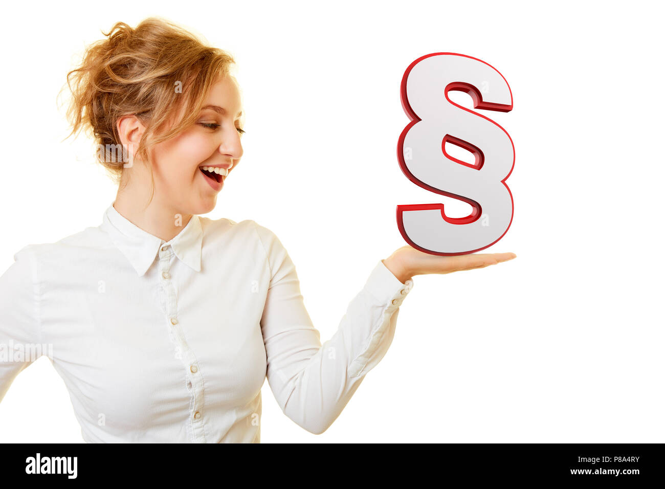 Laughing young woman with a big paragraph sign on her hand as a law concept Stock Photo